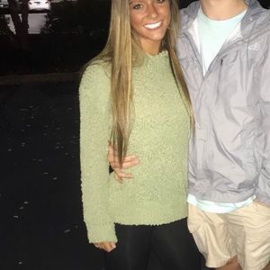 green popcorn sweater